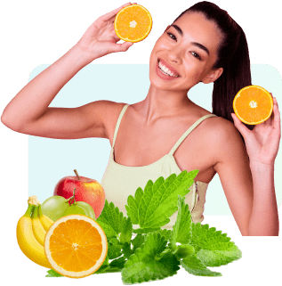 Lady smiling and holding fruit